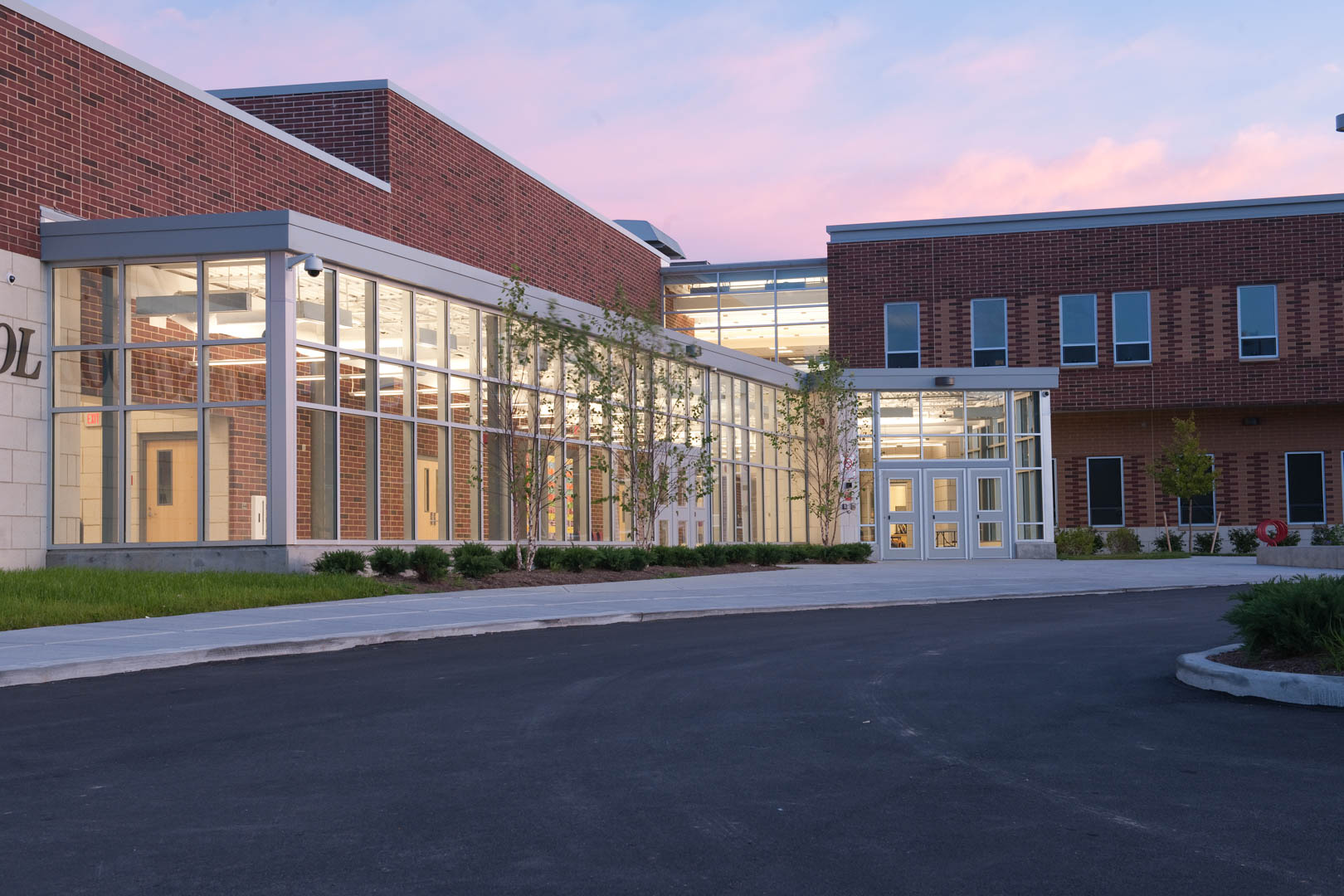 Glass-enclosed entrance pavilion